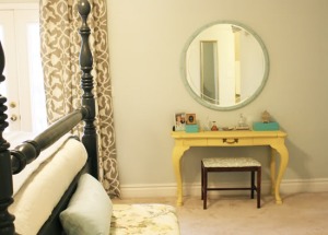 Use a hallway or console table as a beautiful bedroom vanity.